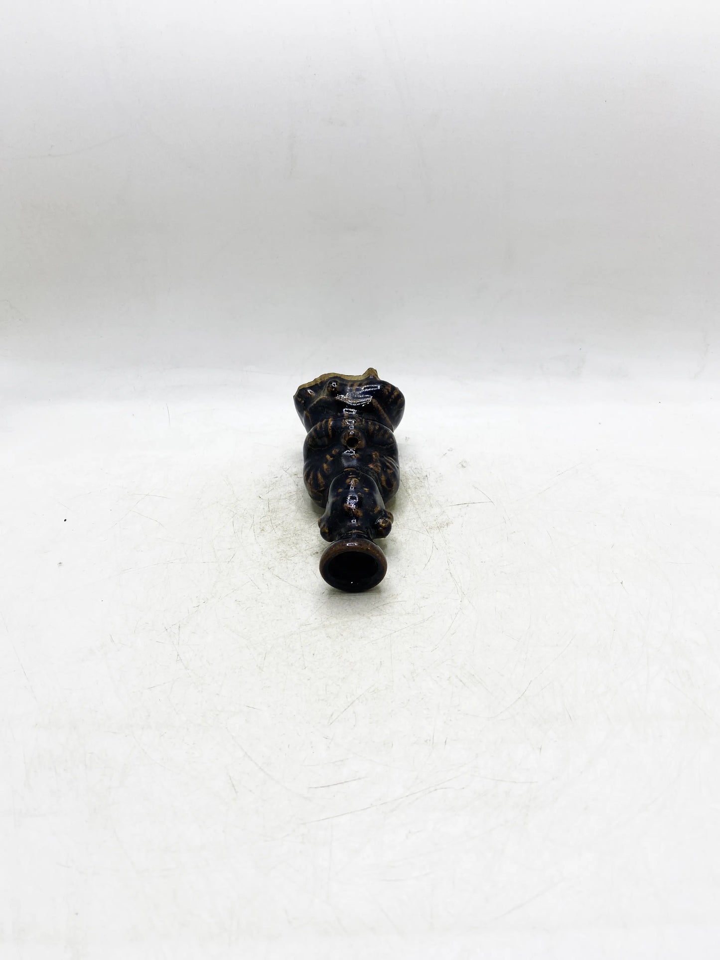 Qing Dynasty Black Glaze Brown-Painted Figure-Form Candlestick