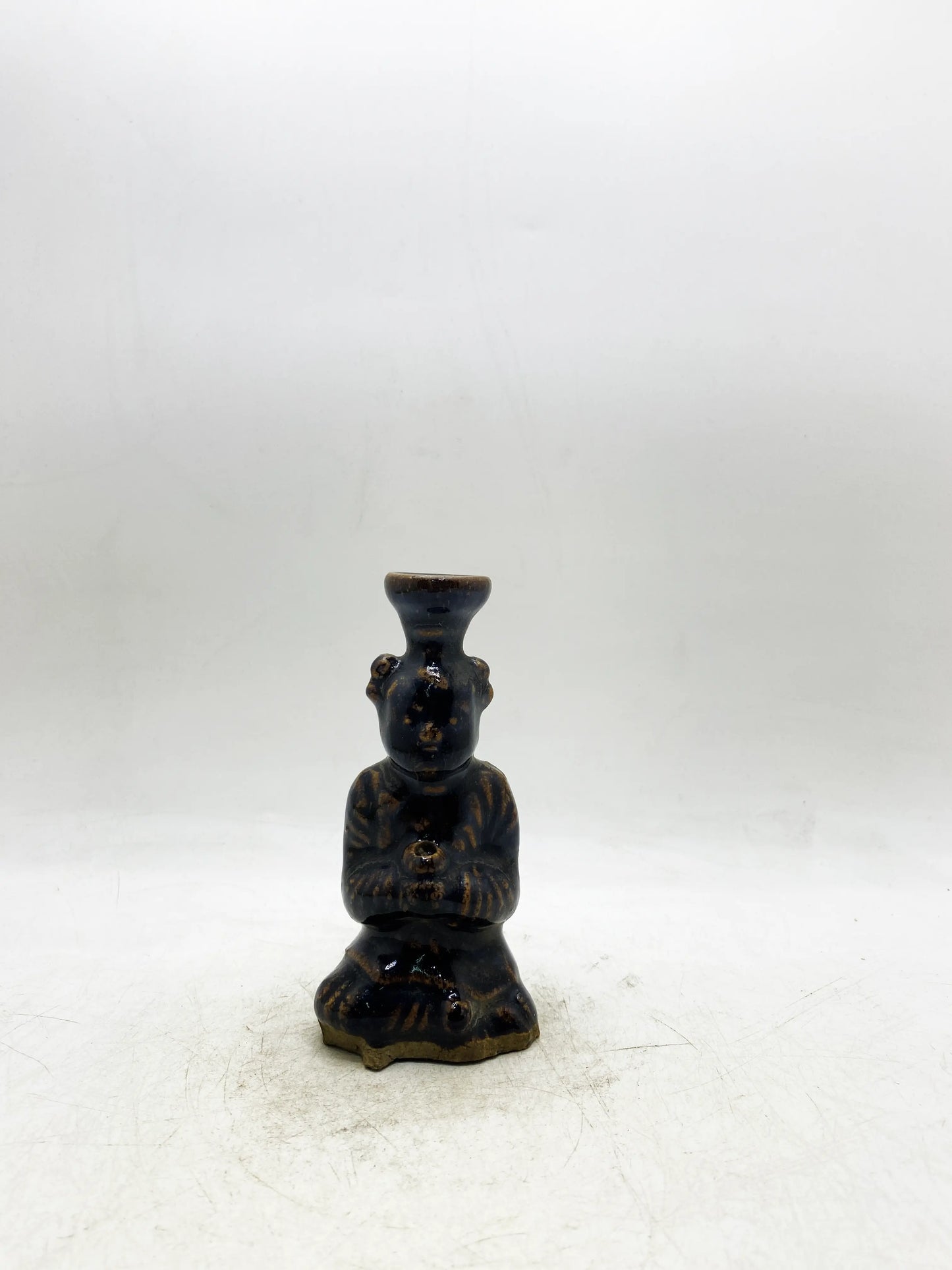 Qing Dynasty Black Glaze Brown-Painted Figure-Form Candlestick