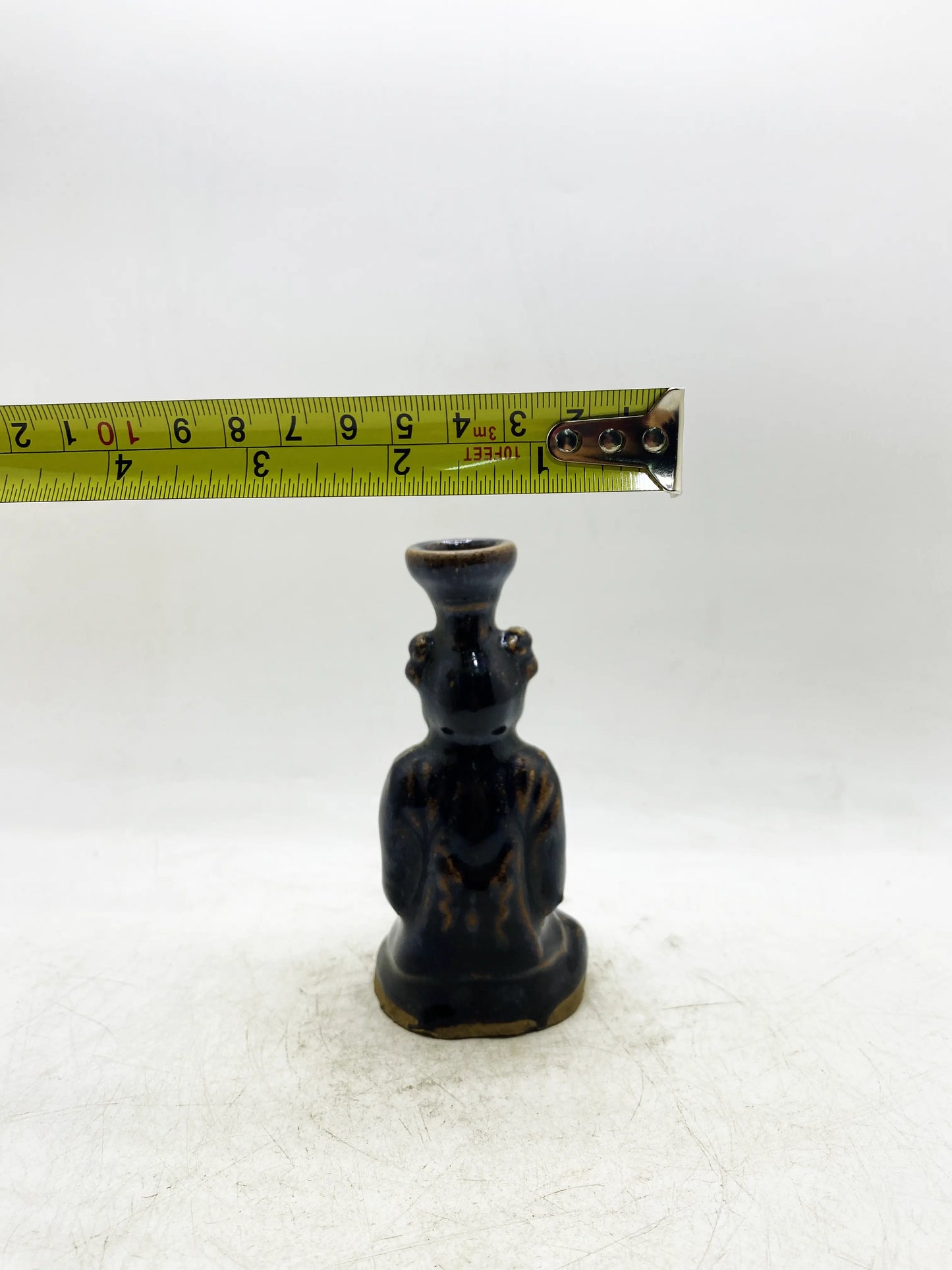 Qing Dynasty Black Glaze Brown-Painted Figure-Form Candlestick