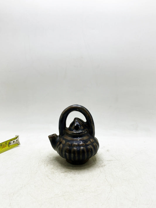 Qing Dynasty Black Glaze Kiln-Transformed Melon-Ribbed Ewer with Handle