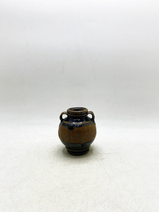 Qing Dynasty Black Glaze Carved Landscape Double-Ear Jar